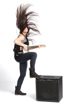 Girl plays electric guitar