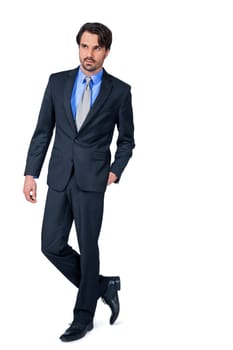 Self-proclaimed young businessman with suit dark hair and beard isolated against white background