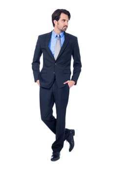 Self-proclaimed young businessman with suit dark hair and beard isolated against white background