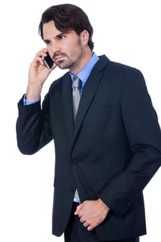 Young businessman with smartphone with dark hair and beard isolated against white background