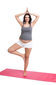 Young attractive mother in swing at training isolated against white background