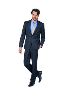 Self-proclaimed young businessman with suit dark hair and beard isolated against white background