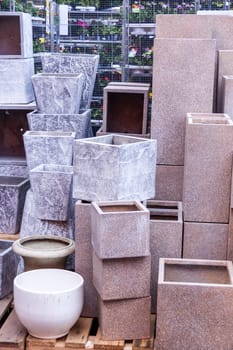 Flower pots made of stone Glazed and unglazed in retail outdoors