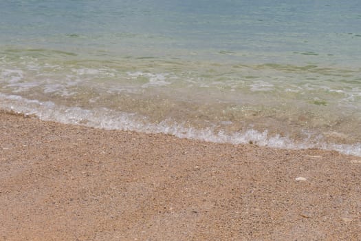 Beautiful secluded sandy beach in the Caribbean with white sand and blue sky as in paradise