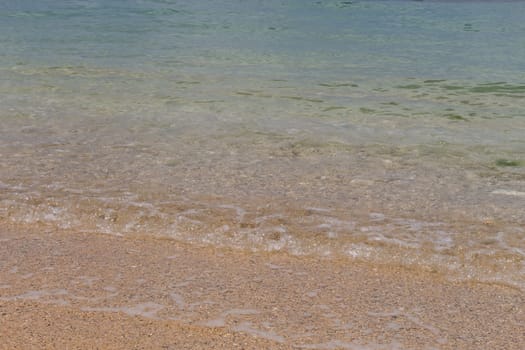 Beautiful secluded sandy beach in the Caribbean with white sand and blue sky as in paradise