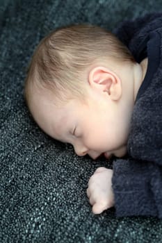A close up shot of a baby sleeping