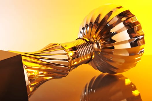 Detailed view of a chrome-plated cup in a special light