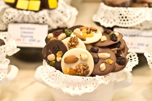 Various chocolates with nuessen and dried fruits