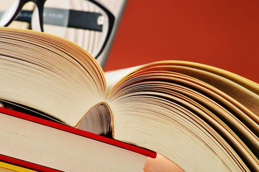 Composition with glasses and books on the table