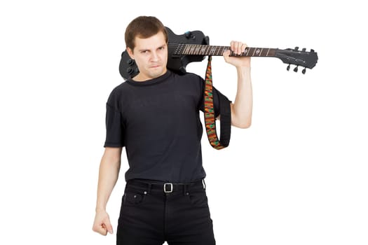 Young man with electric guitar isolated on white background. Performer of rock music