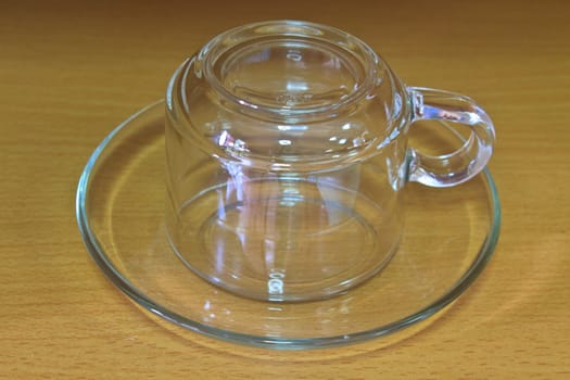 Empty glass tea cup on table wood