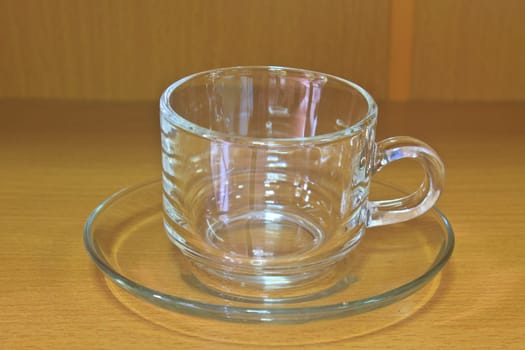 Empty glass tea cup on table wood