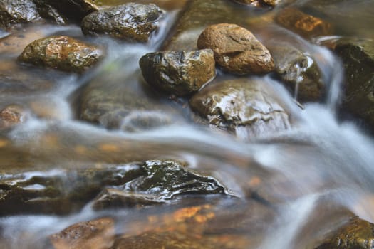 Nature waterfall in deep forest, in national park Thailand