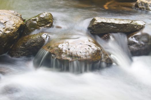 Nature waterfall in deep forest, in national park Thailand