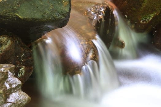 Nature waterfall in deep forest, in national park Thailand