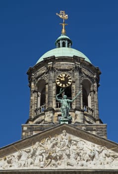 Royal Palace at the Dam Square, Amsterdam. Closeup view of the tower.