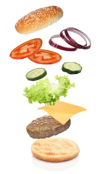 Flying ingredients of hamburger isolated on white