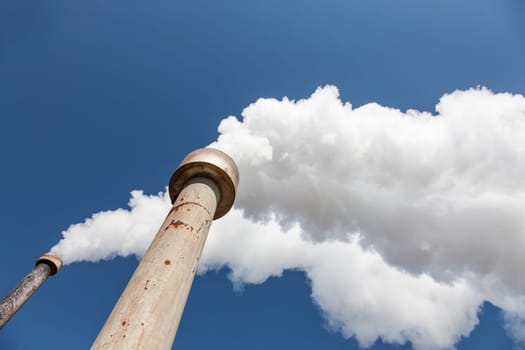 Massive amount of smoke coming from a factory