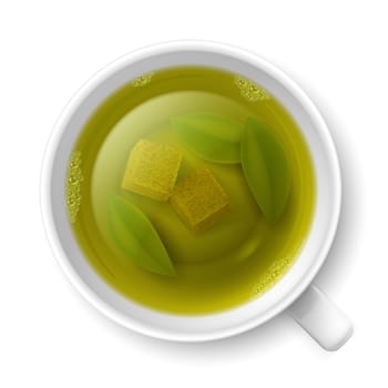 Cup of green tea with cane lump sugar and tea leaves at the bottom over white background