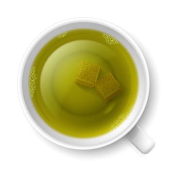 Cup of green tea with lumps of yellow cane sugar over white background