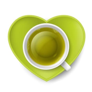 Cup of green tea with saucer in shape of heart