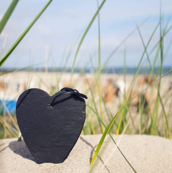 Heart of slate on the beach