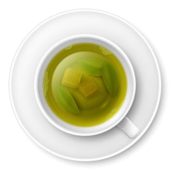 Cup of green tea with piece of cane sugar and tea leaves at the bottom