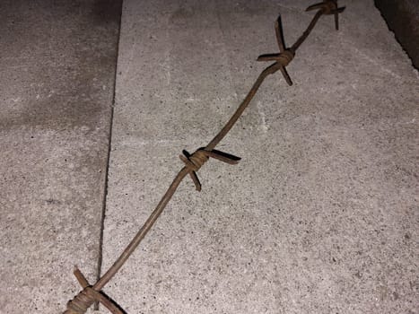 Cutting through a the barbed wire fence