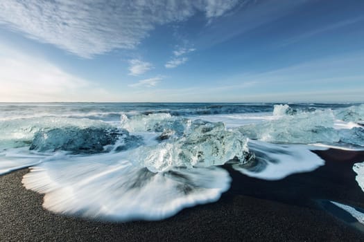 Melting ice on beach near Jokulsarlon in Iceland