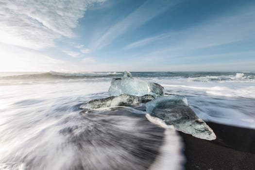 Melting ice on beach near Jokulsarlon in Iceland