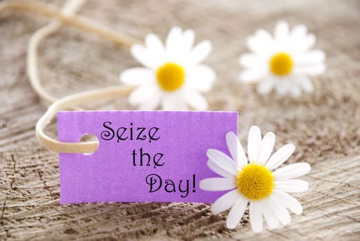 a purple label with white blossoms, copy space and background