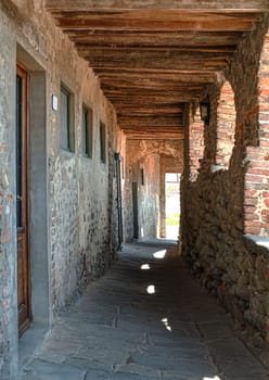 Vintage italian houses with flowers. Sun light