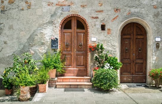 Vintage italian houses with flowers. Sun light