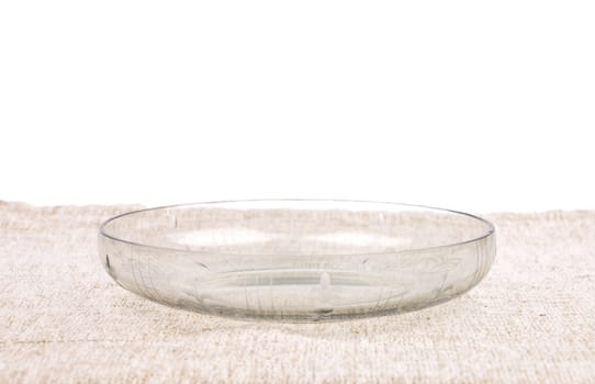 Glass bowl on linen cloth