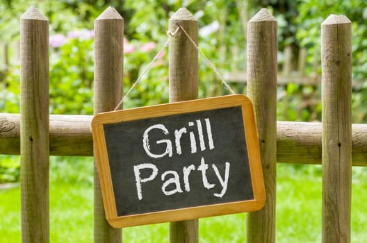 Chalkboard with the inscription Grillparty