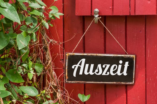 Old tin sign with inscription time-out