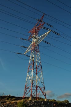 Energy Electricity Power Pylon on a Blue Sky