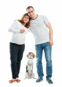 Expectant parents with dog