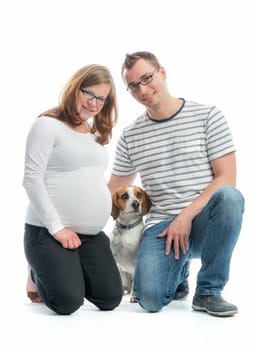 Expectant parents with dog