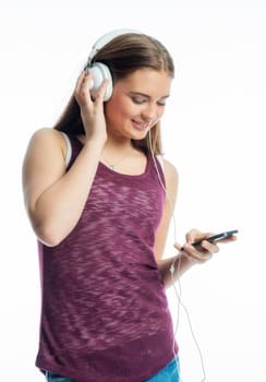 Girl with mobile phone and headphones