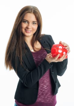 Young girl with piggy bank