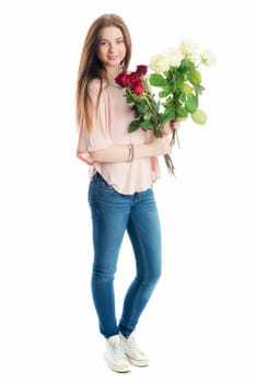 Young girl holds a bouquet of flowers
