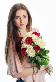 Young girl holds a bouquet of flowers