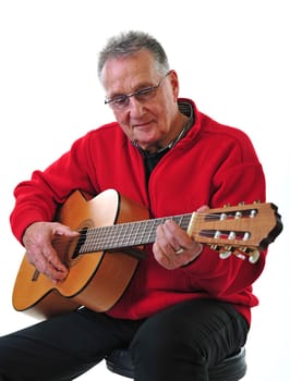 Retired pensioner plays guitar