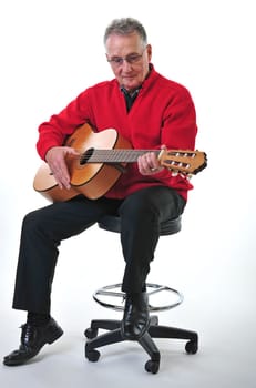 Retired pensioner plays guitar