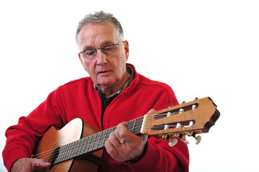 Retired pensioner plays guitar
