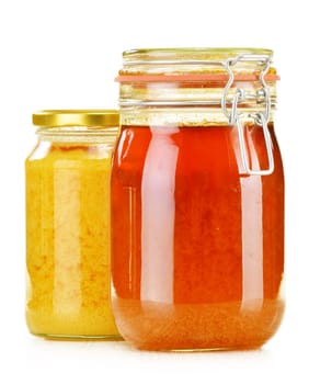 Composition with jars of honey isolated on white background