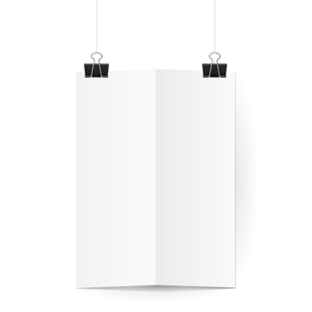 White sheet of paper folded in two hangs on two black  binder clips