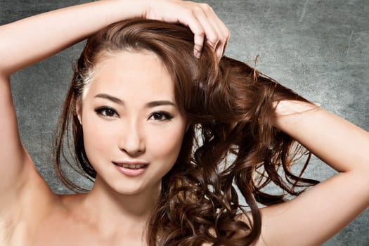 Asian beauty face closeup portrait with clean and fresh elegant lady. Studio shot.
