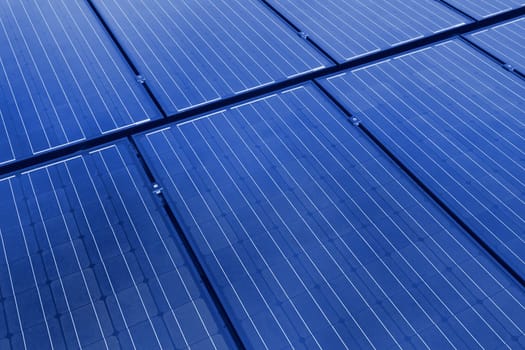 Background image with close-up of solar panels